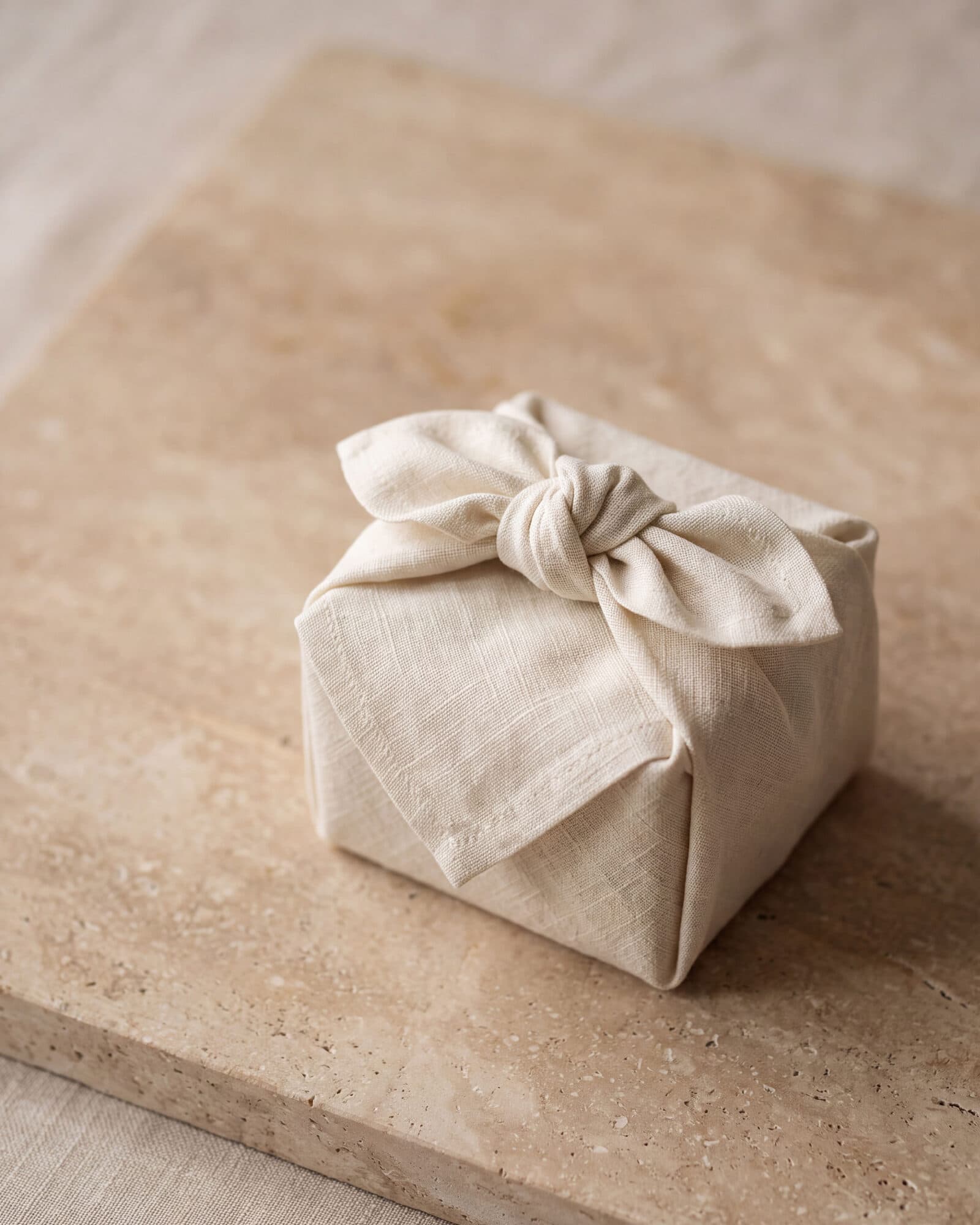 A gift wrapped in natural linen